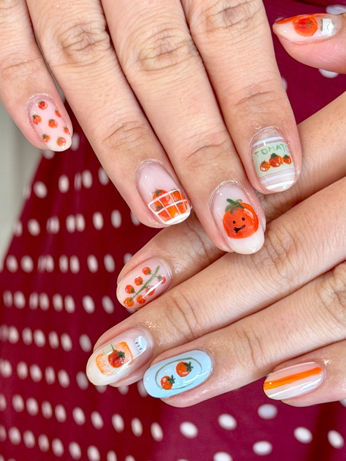 Playful fruit and pumpkin nail art